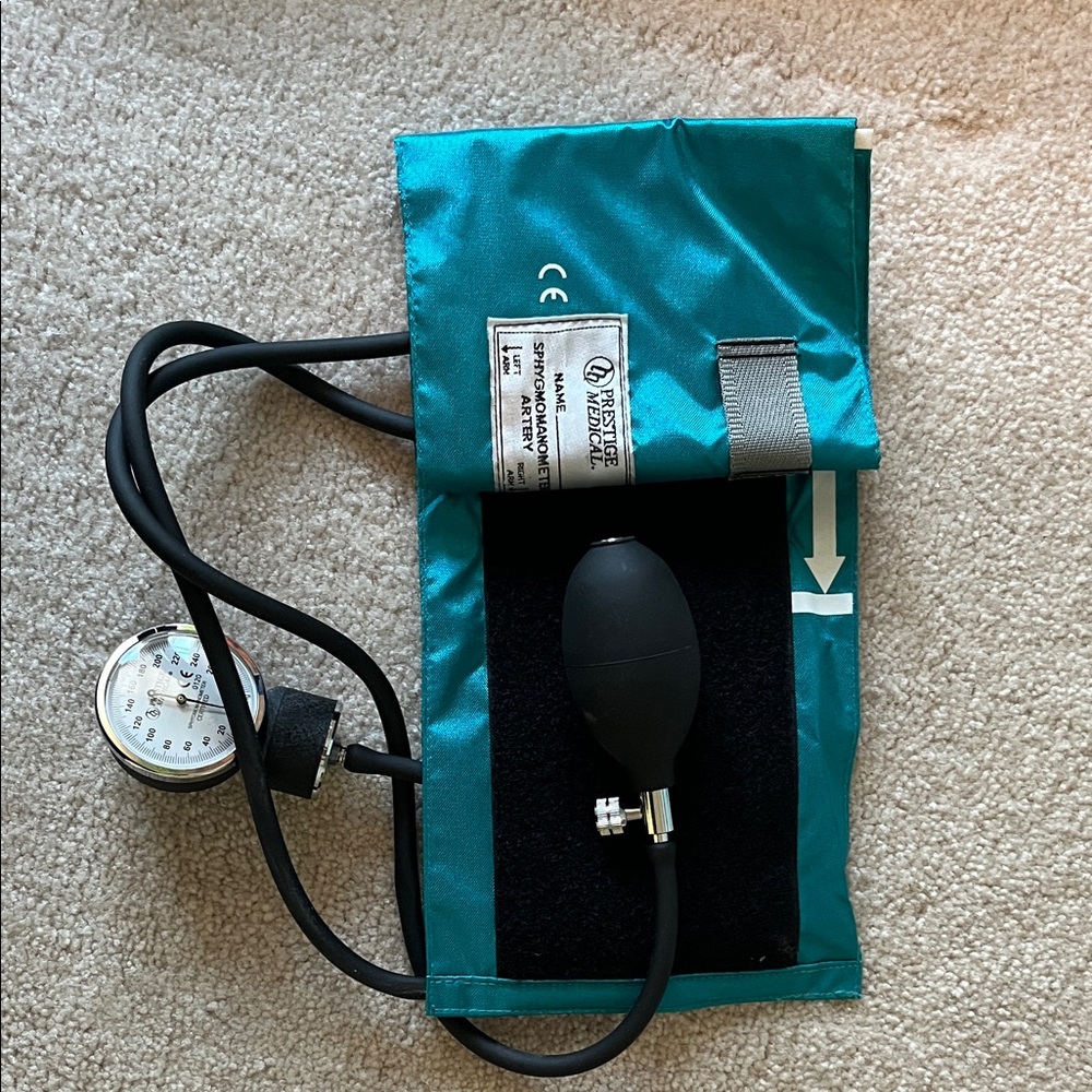 Teal Blood Pressure Monitor with Black Bulb